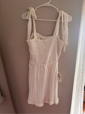 NWT | bow tie ivory, linen blend smocked Romper‎